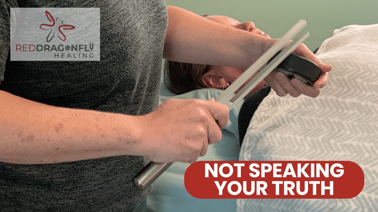 A person holds tuning forks near someone lying on a bed, with the text Not Speaking Your Truth and the Red Dragonfly Healing logo in the corner.